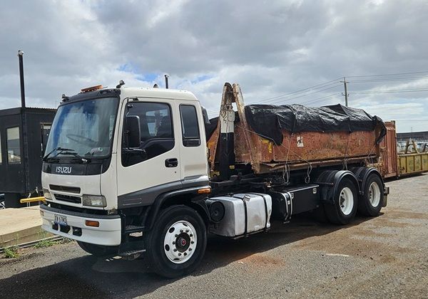 Hook Lift Skip Bin Truck in Brunswick yard